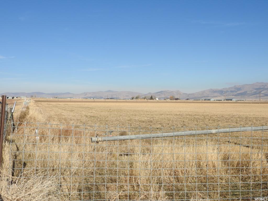 Moroni, UT Located in Freedom. Additional tax id: 25039X 25040, 25046, 25047, 25048. Folks, if you're looking for farm ground that has it all, this is the piece. This property has irrigation water shares, hay crop, wheel irrigation lines, corrals, livestock holding chutes, excellent area to build your ranch house and an old pioneer house that needs lots of work, beautiful views of the valley and mountain ranges and highway frontage on two sides, located in beautiful and quiet Freedom, Utah. Buyer to verify all information.