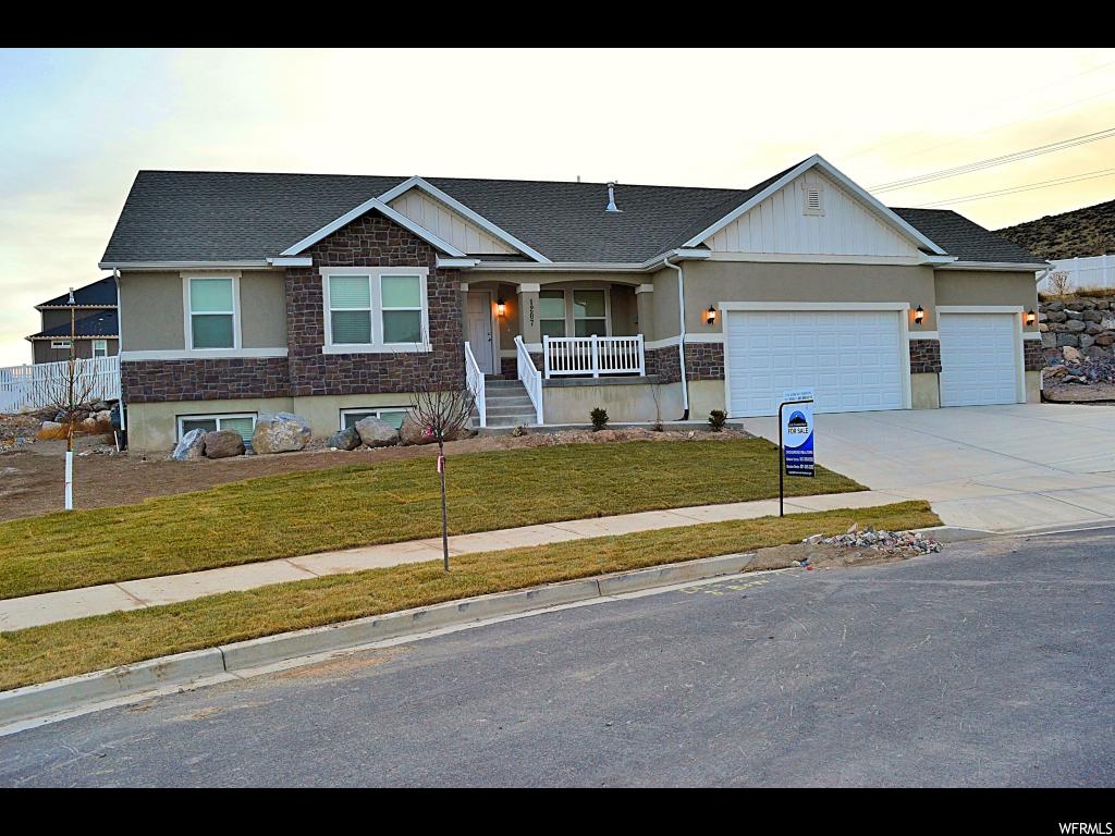 1207 W ZENITH CIR Saratoga Springs, Utah Amazing home built on Mount Saratoga with mountain and valley views. This home features an open floor plan main living area with a finished basement. The home has solar panels, upgraded quartz countertops, a large island, stainless steel appliances, upgraded carpet and flooring, large windows with natural lighting, a dual vanity with a walk-in shower in the mater bath, and an extended home warranty. The backyard has a large patio and is located near the top of a cup-de-sac with access to trails and parks nearby. . Call today to schedule a showing!