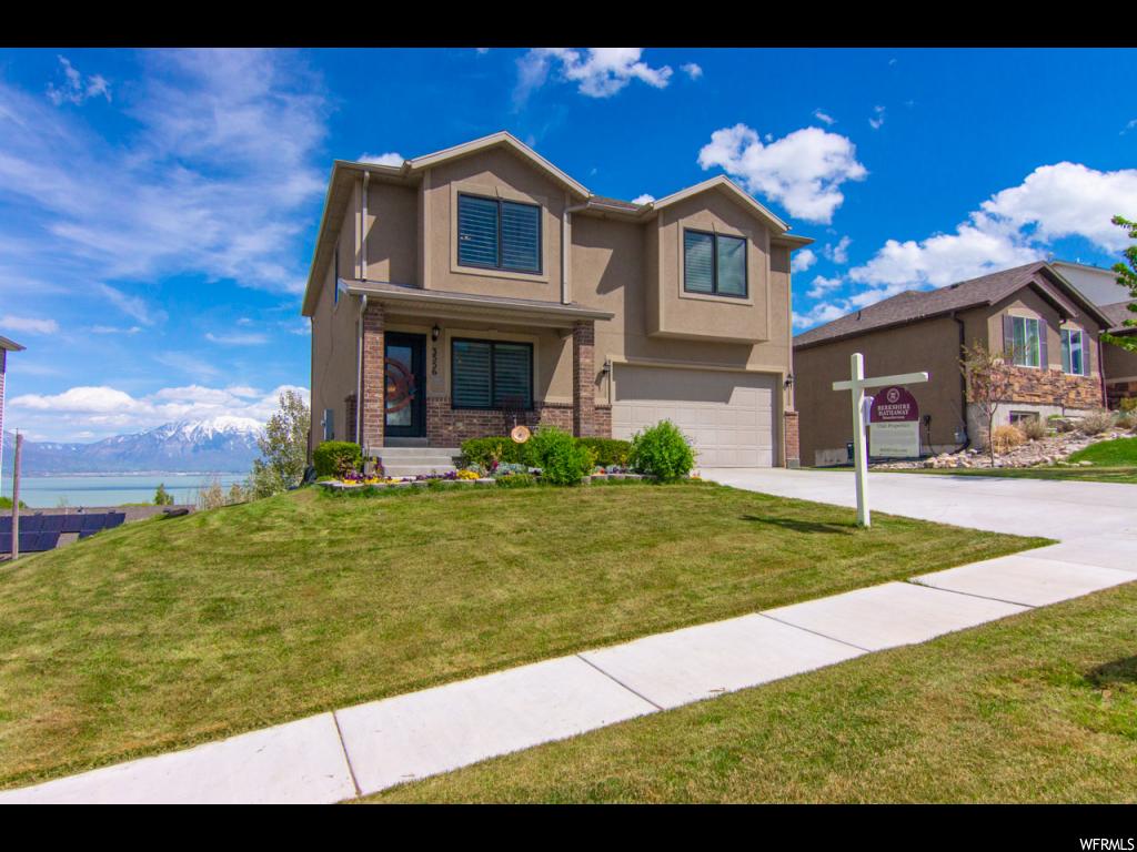 3556 S HAWK DR W Saratoga Springs, Utah Includes a one year Home Warranty. GREAT VALUE! Fully finished 3811 sqft, 5 Lrg Bedrooms, 3.5 Baths, with stunning & unobstructed views of Valley, Lake & Mountains. Open & spacious Great-room. with walk-out Family Room, Bedroom & Bath in basement. It sports a beautiful a custom iron front door ($5000), Anderson windows, plantation shutters, generous wainscoting, fresh pain, light fixtures, crown moldings and trim, HUGE pantry, double decker deck, large closets, full exterior stucco, custom workbenches and overhead storage in garage.