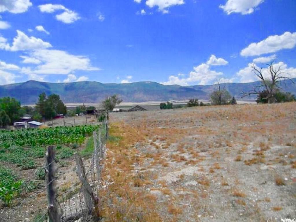 455 200 W N Moroni, UT #1 Now Pre-selling Build-Ready Lots! 3 lots just under 1 acre each with a great view over the valley and mountains. All utility connections stubbed at the road. Ready by early spring. Build your home here in the quiet town of Moroni. Buyer to Verify all info provided by county records.