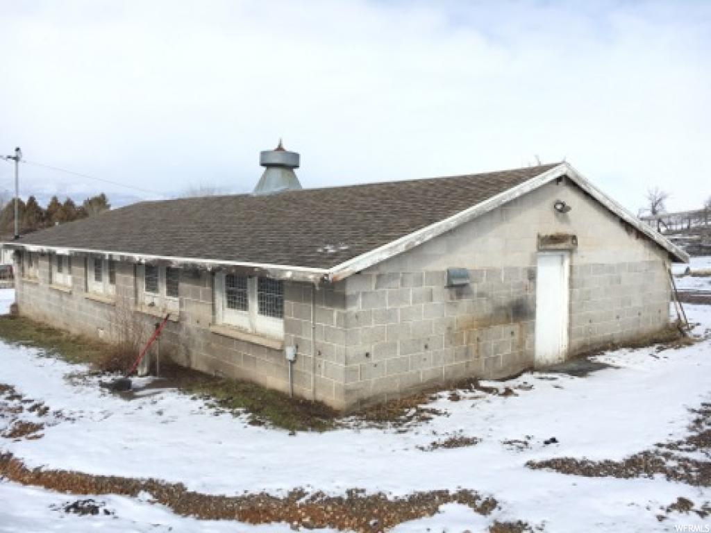418 200 W N Moroni, UT Pre-selling Build-Ready Lot with a 60x30 Shop with power already built on over 1/2 acre! All utility connections stubbed at the road. Ready by early spring for Building. Build your home here in the country town of Moroni. Buyer to Verify all info provided by county records.