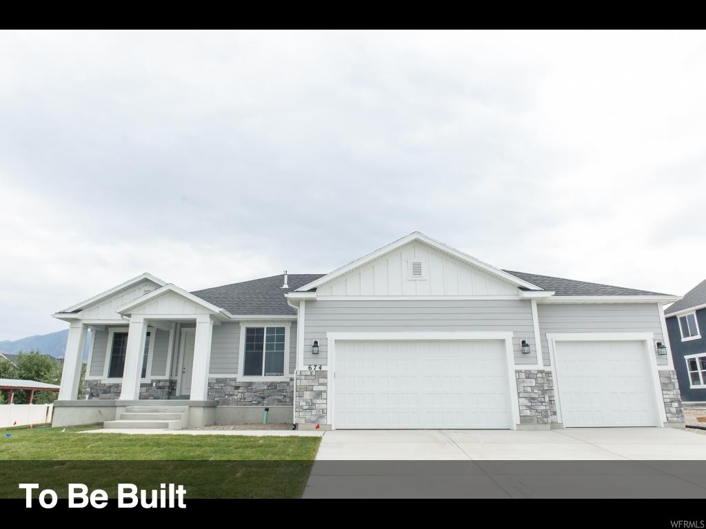 49 E GARIBALDI WAY WAY 304 Saratoga Springs, Utah Utah County's fastest-growing home builder! Our Washington floor plan features the best in standard options, like master and great room vaulted ceilings, a 95% efficiency furnace, two-tone paint, solid knotty alder cabinets with staggered uppers and crown in the kitchen, wood closet shelving, and unlimited options to make your home uniquely yours. Choose this floor plan or any of our other incredible floor plans. Let our award-winning design team help you arrive at your forever home today! -Seller to Provide Level 1 Craftsman Hybrid Exterior & Lap Siding on the side of the home