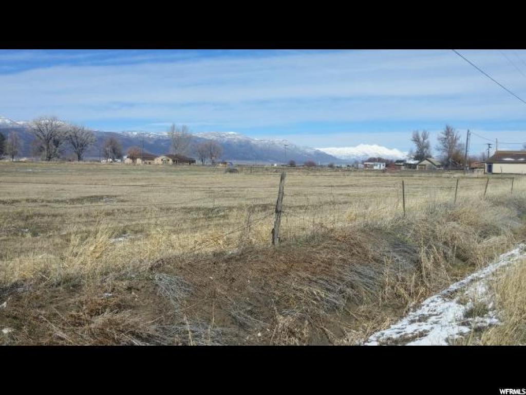 13700 4000 E N Chester, UT 32 acres with 20 shares Moroni Irrigation water. Fronts on both State Hwy 132 and County Road 117. Zoned commercial and agricultural. Productive land - alfalfa mix and grass alfalfa . Currently leased. Map is as close to being correct as I can get it. ; )