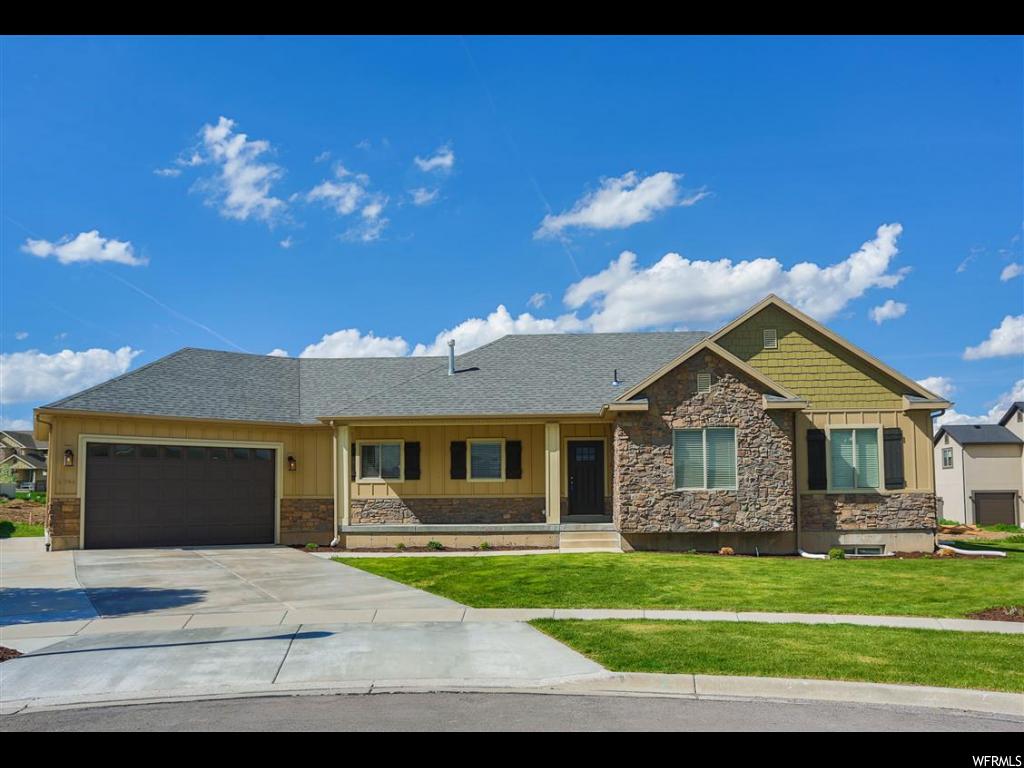 1746 N MAPLE CIR Saratoga Springs, Utah WELCOME HOME! Hard to find Saratoga Springs Rambler that is move in ready! This home is only a couple years old and is better than new. It features STAINLESS STEEL appliances with a gas range, gas fireplace, laminate flooring throughout most of the main level, upgraded carpet, CUSTOM TILE and GORGEOUS master bath. The home has a large master bedroom with a walk-in closet and separate his and her vanities. COME CHECK OUT THIS KITCHEN it features with nice white shaker cabinets and HIGH END GRANITE, This home has many upgrades and is truly a MUST SEE!
