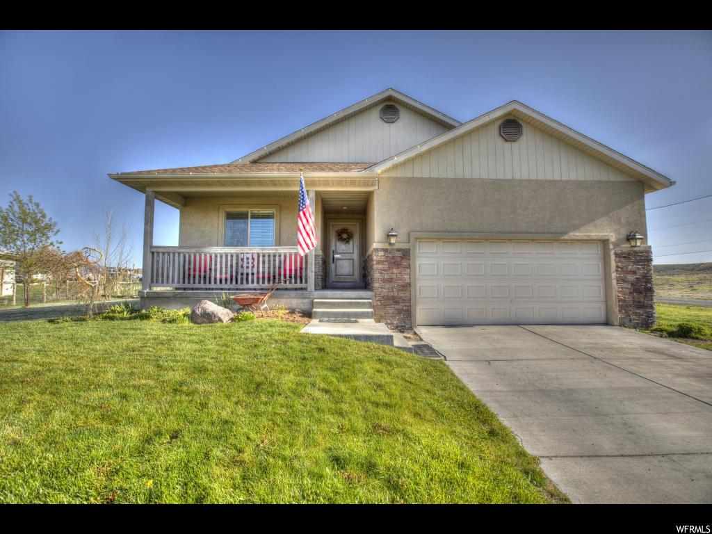 195 400 N E Moroni, Utah A beautiful custom built home.... just want you have been looking for! Inviting entry way with a grand staircase. Nice open floor pan. Beautiful wood floors throughout. Master bedroom has a large walk in closet. Lovely master bath with separate tub and shower. Kitchen has concrete counter tops and stainless steel appliances. The downstairs is finished beautifully with a large family room with plenty of space for large gatherings. Don't forget the awesome back yard with a full automatic sprinkler system and a 14X12 patio. You don't want to miss out on this great home! Square footage figures are provided as a courtesy estimate only and were obtained from ______________ . Buyer is advised to obtain an independent measurement.