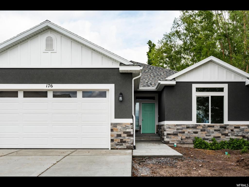 176 E BROOKSHIRE DR Saratoga Springs, Utah This beautiful custom, south-facing, brand new craftsman home backs the park and has all the upgrades you would expect! Enjoy single-level living in this lovely rambler. This home features a gourmet kitchen with white cabinets, stainless appliances and beautiful granite countertops. Fenced on 2 sides already. Lots of storage in the crawl space. Must see!