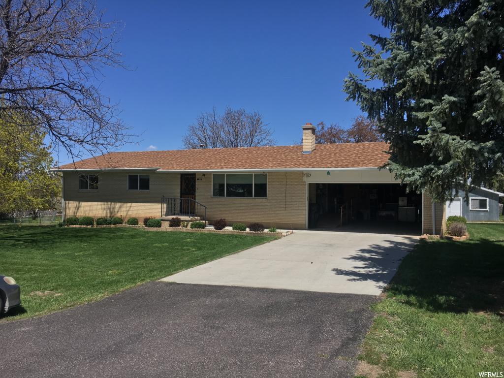 185 300 S E Spring City, Utah 5 Bedrooms, 1 and 3/4 bath, plus another half bath. 1316 sq. feet of living space plus a full basement for a combined total of 2632 sq. feet. The family room is located in the basement with a sewing room off the side. All this on 1.06 acres with fruit trees, mature landscaping and six shares of irrigation. Did I mention the shop? Four bays, a loading dock, roll up doors, plumbing and power! This is a must see.