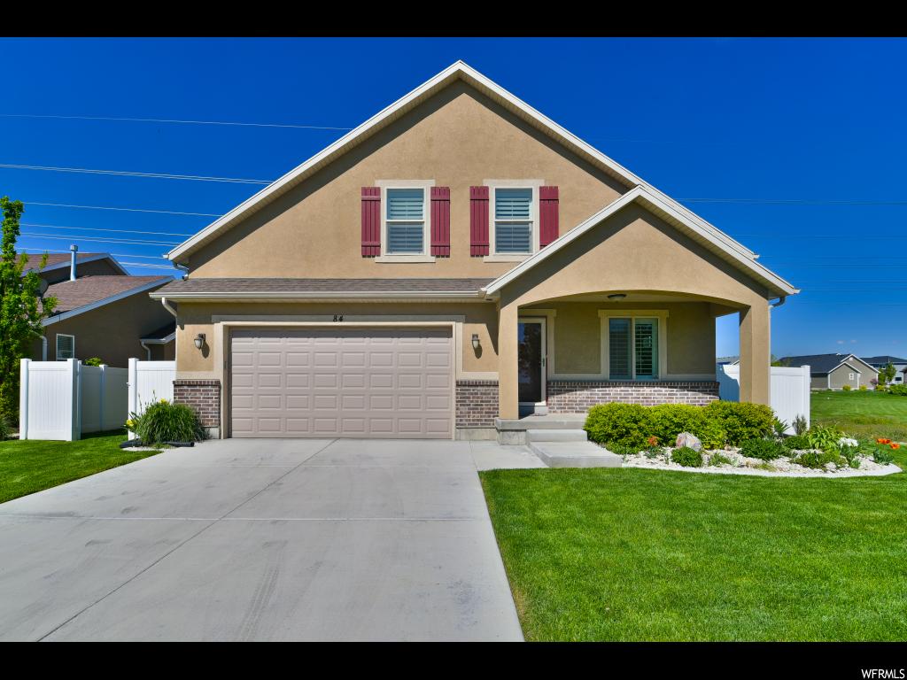 84 W LAKE VIEW TERRACE RD Saratoga Springs, Utah This meticulously maintained one-owner home is located in a peaceful, safe & friendly neighborhood, within walking distance of Utah Lake, near schools and future Temple site. Pastoral, rural feel but quick access to cities and many parks, walking, hiking and biking trails. Enjoy views of Utah Lake, mountains and Utah Valley surrounded by beautiful scenery of wildlife and sage covered cave hill. You will appreciate the Builder's attention to every detail in this well-built home featuring: Baker's kitchen, expansive cabinets, granite countertops, hardwood floors, plantation shutters, 2 & 3-tone paint, bright large great room w/gas fireplace, etc... Beginning with the inviting front porch to the flex room off the entry that could be used as a living room, study; craft room; music room; or main floor bedroom through this unique floor plan with spacious rooms, plenty of closet & storage space, relaxing master suite, nice open loft area, custom bathrooms, fully finished basement professionally completed by the builder and ending in the fenced well manicured yard with an oversize concrete patio and delightful planters. Finally save money each month with low utility bills and energy efficiency from zoned HVAC and extra insulation. Must see!