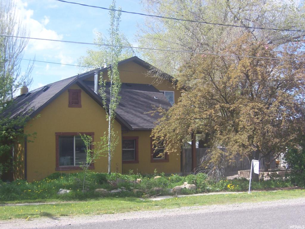 50 100 S E Fairview, Utah Spacious, family friendly home. 6 bedrooms or more. 3 and 3/4 baths, (1 with sauna). Office and bonus room/workshop or man cave. Large secluded back yard with large trees,& shed. This home has many possibilities and a lot of room. Green house built on the back. (Owner is currently splitting off part of the property and wood fence to the west will be moved 40 feet to the east and greenhouse frame will be removed. Lot size will be .52 acre after split). Round trampoline is included Chain link, field wire and wood fencing in the back yard.