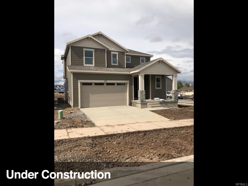 712 W BLUE VIOLET DR. S Saratoga Springs, Utah Wild Rose - 136 - Jackson. ESTIMATED COMPLETION JUNE 2019. This beautiful Jackson home design features 3 bedrooms, 2.5 bathrooms, and a multipurpose loft space. The main floor includes an open-concept great room, and kitchen with stainless steel appliances including the fridge and gas oven and range, white quartz countertops, and upgraded light grey craftsman style cabinets. The second floor offers three bedrooms, full bathroom with quartz countertops, and grand master suite with double vanity and walk-in closet. This home includes smart features such as: Echo Dot, Schlage Smart Lock, Honeywell Lyric Thermostat, Ring Video Doorbell, and LiftMaster Garage Door Opener with MyQ Technology. This home backs vast open space! Other Lennar "Everything's Included" home designs, elevations and color combinations are available! Wild Rose is now open with two "everything's included" model homes.
