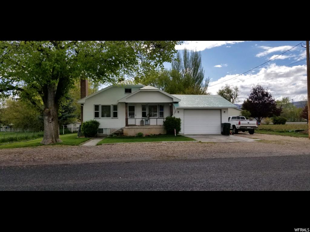130 100 E S Fairview, Utah This Mid Century Bungalow comes with all of the charm of original hardwood floors in the living and dining area (with hardwood floors under carpeting through most of the upstairs), original craftsman molding/doors and adorable cabinets. This charming home offers beautiful mountain views and the yard provides plenty of shade for outside summer gatherings. Nestled in the foothills of Manti-Lasal Mountain (Fairview Canyon) , you can be to the top in 15 minutes and be entertained year round with recreational activities. All windows and electrical have been updated. Immaculate home and yard. Plenty of storage. Irrigation water share included. Square footage figures are provided as a courtesy estimate only. Buyer is advised to obtain an independent measurement. Buyer's agent must be present during all showings. Call today to schedule an appointment to view this charming home!