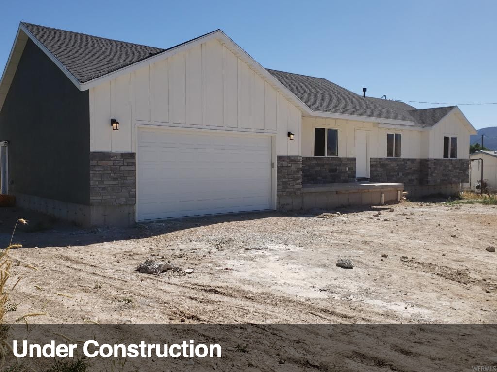 265 400 N E Moroni, Utah Beautiful newly constructed home. Will be complete by August 1st. Large master bed and bath. Large walk in closet. Beautiful custom cabinets with concrete counter tops. LVP flooring through out the kitchen, dinning and living area. Huge family room in basement. Outside entrance to basement. Basement is completely finished with 2 bedrooms and 1 bath. Nice size garage. Home sits on .54 acre. Room for your animals. Taxes have not yet been assessed because of new construction. Owner / Broker. More pictures coming soon.