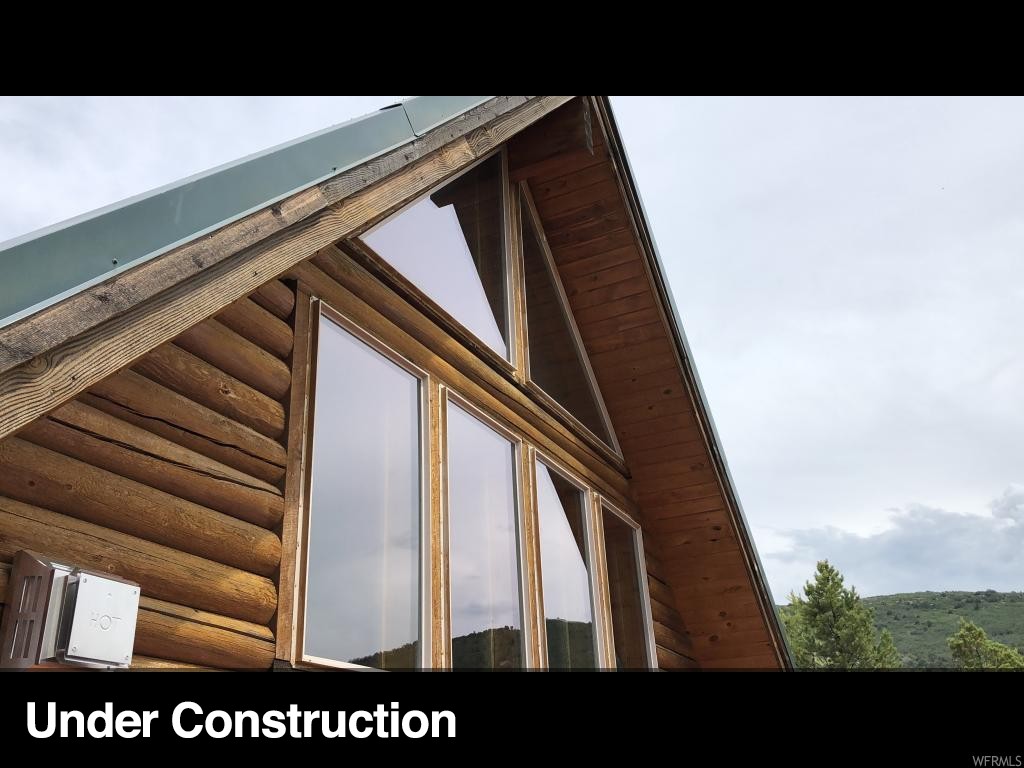 9993 33610 N E Fairview, Utah Own your own slice of paradise in this 2 bedroom 1 bath cabin situated on 5.16 acres in Blackhawk Estates Fairview. Large trapezoid window feature is among several others boasting a plethora of natural light. This log cabin features 2 bed, 1 bath, living room, semi-formal dining and kitchen on one level. There is a large loft space on the upper level with balcony boasting endless views. Property features a working well and water tank. See attached youtube video to get the full experience before seeing it live! Just up from the brand new 3 bay fire station. Offered as-is. Buyer to verify all information including sq ft, lot size, etc.