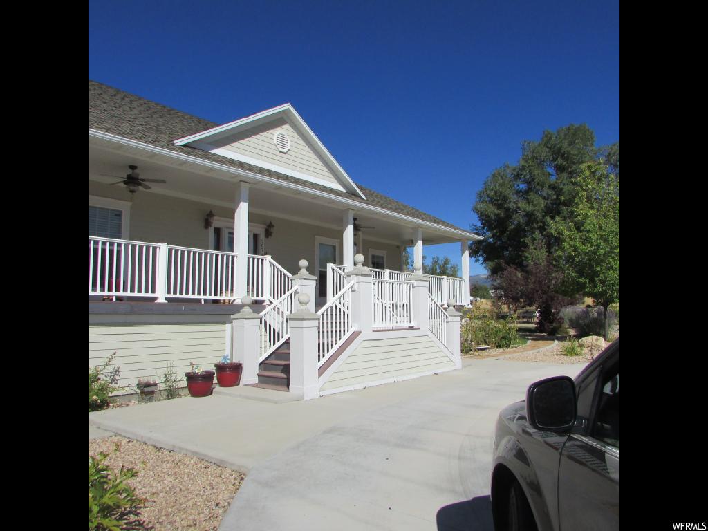 287 400 N E Spring City, Utah Beautiful home on a corner lot. Trees, circular drive. Many upgrades, large beautiful kitchen. Front & back decks, basement entrance, out buildings for ATV's, riding mower, etc. Fenced garden area. All info to be verified by buyer.
