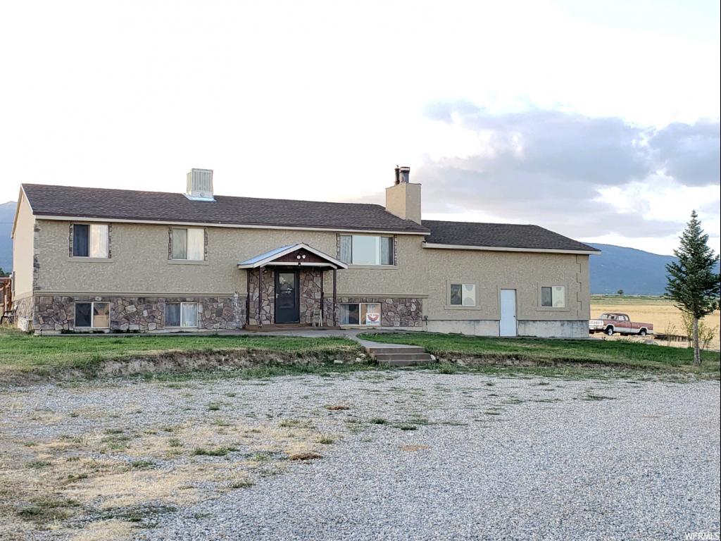 8700 15000 N E Spring City, Utah *~*~*~*RANCH/HOME 6 bed/3 bath with acreage!!! You can enjoy quiet country living and majestic mountain/valley views with many updates inside and out. County maintained road; plenty of space to grow large garden, pasture, livestock property. Just 60 miles to Provo, property located within Sanpete County 1 mile from Historic Spring City center/limits. Within the "buffer zone" for possible/further subdividing into 1 acre lots, subject to appropriate approvals. Culinary well and pressurized irrigation; septic; propane. Main floor features 3 bed/2 bath; kitchen; living room; finished basement with 3 bed/1 bath; large family room; wood stove; laundry room; private mud room; walkout to garage. Central air/HVAC (Lennox 2013) roof 6 years old; updated doors/windows installed 2003; Large over sized garage, covered deck; tack shed; chicken coop; tool shed; and wood shed. Additional land available; greenbelt option w/acreage. Property is frequented by deer, elk, and wintering eagles. ****East 1 mile from HWY 117 at 15000 North (aka 900 East) north of Spring City (south of church); located on South side of road facing Northwest. ~~~LISTING AGENT MUST ACCOMPANY BUYER AT ALL TIMES; MUST PROVIDE REASONABLE NOTICE FOR ALL SHOWINGS. LIVESTOCK MAY BE PRESENT. Square footage figures are provided as a courtesy estimate only and were obtained from Sanpete County. Buyer is advised to obtain an independent measurement. ****ADDITIONAL LAND AVAILABLE AT ADDITIONAL COST*** SEE MAPS SCANNED IN WITH PICS***