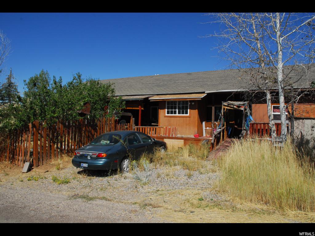 22130 11750 E N Fairview, Utah wonderful location. needs work could be for married couple, single person or used for a weekend vacation home. Has lots of possibilities. Stream running through the backyard.