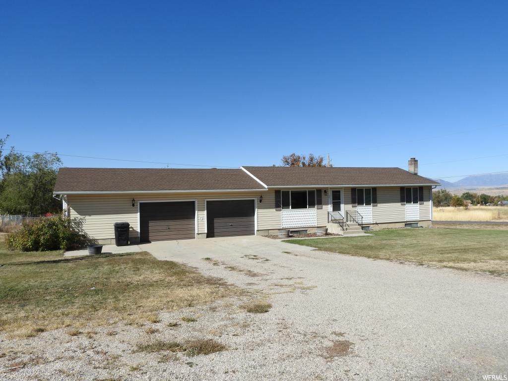 24 500 E S Spring City, Utah Here's a great little home located in a wonderful location with views of the valley and mountain range. Only one block from the Spring City elementary school. The main level has new carpet, new paint, new bathroom, new natural gas water heater, walkup from the basement to rear yard area, fenced garden area, some fruit trees and corner lot location. The garage is very large with shop area on the South end. Square footage figures are provided as a courtesy estimate only and was obtained through county records. Buyer is advised to obtain an independent measurement and verify all information. Agent and seller's are related.