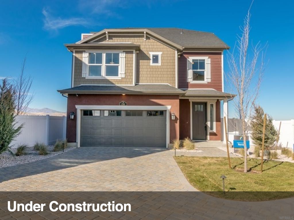 156 E BRUSHY CANYON ST S 334 Saratoga Springs, Utah TO BE BUILT - You must see these beautiful Carriage Homes in "Wander", our amazing Master Plan community in Saratoga Springs! This community is filled with parks, schools, hiking and biking trails, pools, a clubhouse and much more! Come and check out "Wanderland", the 18 model home complex. These Homes are spacious and open! A must see! When you step into the Surrey, you will be welcomed by a large open great room, kitchen and dining area with large eat-in island! Upstairs you will find two secondary bedrooms, a secondary bath, laundry room and a large master suite complete with duel vanity sinks, a walk-in closet and a walk-in style spa shower! Check out the Guaranteed Energy Program! Call now for more information or to set up a time to show this home! **Pictures and Tour are of the Model Home** (Surrey Lot 334)