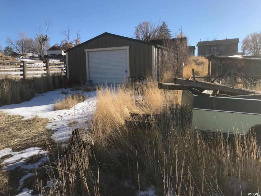 275 120 N W Moroni, Utah BUILDING LOT IN MORONI..existing 22'x30' metal building/garage and a couple of additional outbuildings; pedestrian access along the back. PERFECT LOCATION with a view!! Square footage figures are provided as a courtesy estimate only and were obtained from Sanpete County. Buyer is advised to obtain an independent measurement.