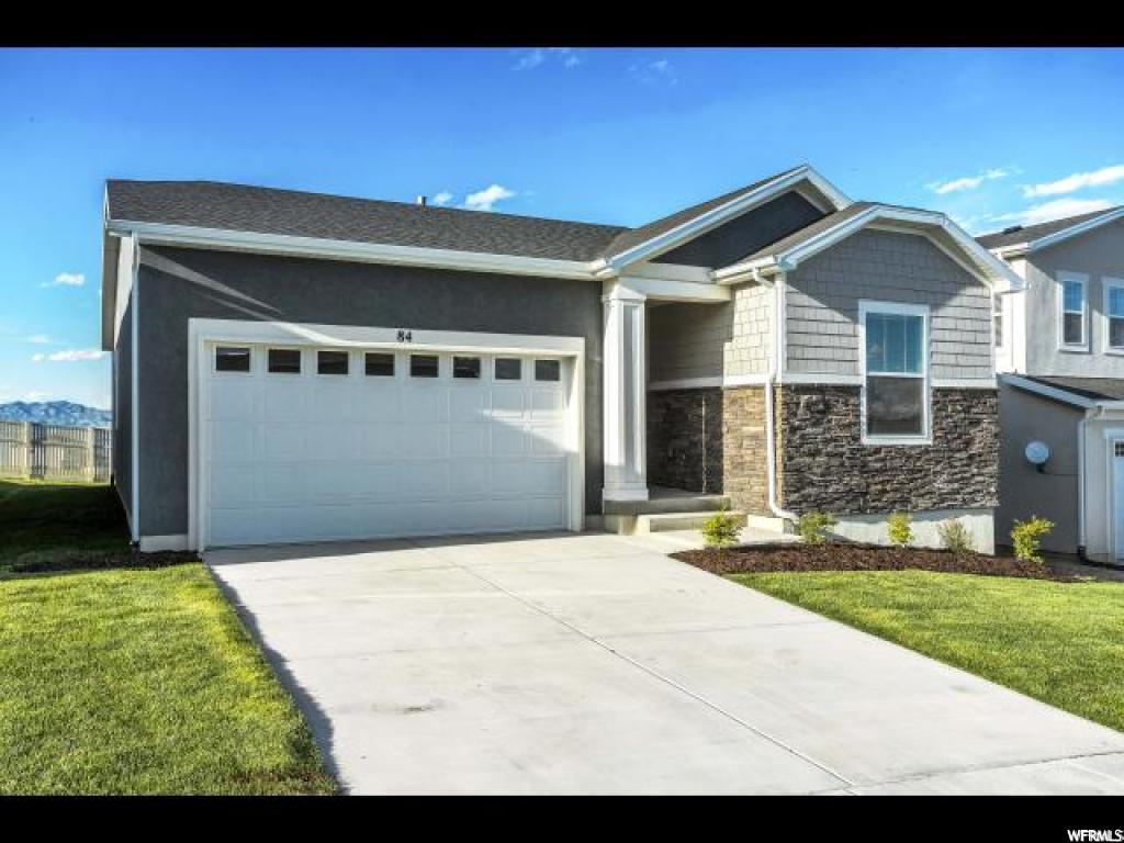 84 W SWAINSON AVE S Saratoga Springs, Utah Why wait and build, when your new home is ready today? Spotless and clean with full landscaping with window coverings. Backing a park with panoramic views to the north of the valley. This single level-living floor plan offers an open layout that's perfect for entertaining. Gather with friends and family in the expansive great room, dining room and kitchen, includes a zero maintenance trex deck for additional outdoor living space to sit and enjoy that view. The master bedroom has a large walk-in closet and a private bath. 3rd Bedroom wall, door and closet to be added at buyer's request with any full price offer. Ask to see it today!