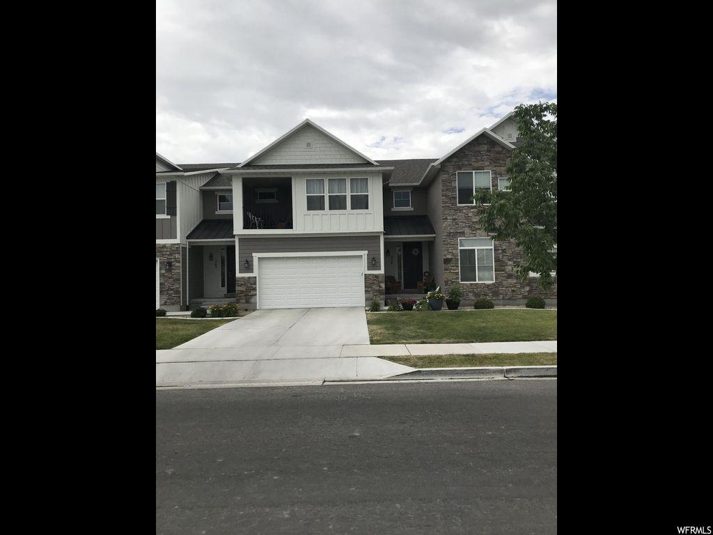 259 E ALHAMBRA DR Saratoga Springs, Utah This beautiful like new townhome located in the heart of Saratoga Springs, with easy access to I-15 and Redwood road. Close to Smith's Market Place, Walmart, and Costco planning to be built in the near future. Fast food and plenty of restaurants nearby. This home features 4 beds, 2.5 baths, 9 foot ceilings on the main with spacious floor plan that will allow for entertaining and open concept living. This is a must see!