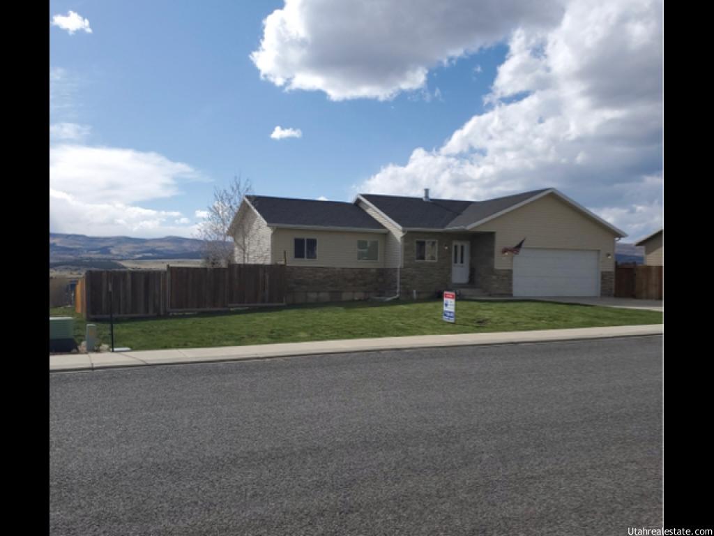 555 100 E N Fairview, Utah This home is a must see. Charming fully finished home at the gateway to Skyline drive. Great mountain view from the front porch. Fully fenced back yard with 6 foot fencing as well as 2 man gates to access the back yard. Rv parking on the side. Open living/kitchen concept with a formal dining room. Large master bedroom with walk-in shower. Nice bright family room in basement with fireplace inserts ready to add a fireplace if desired. New flooring throughout home. Water heater is 2 years old. Front yard is fully landscaped. Back yard gets to be finished to your desire. Perfect for your dogs as it has a doggie door from the house to the garage and straight out to the backyard. Square footage figures are provided as a courtesy estimate only and were obtained from Sanpete County. Buyer is advised to obtain an independent measurement.