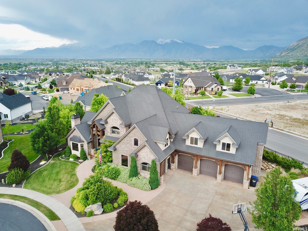 727 E SUNFLOWER S Salem, Utah Exquisite home with spectacular views in the perfectly located quiet neighborhood of Harvest Ridge. This is the builder's own home and the superb craftsmanship and quality is present throughout. This is truly a custom, one of a kind home. Inside features include 8 bedrooms, 5.5 bathrooms, game room, home theater with 120" screen, gorgeous gourmet kitchen with plenty of room for family meals, radiant heat throughout the basement and master bathroom for more efficiency and comfort. Outside features: entertainment space galore!! Relax under the pergola next to the cozy outdoor fireplace. Drop the automatic screen down and enjoy a tv show or invite friends over to BBQ and watch your favorite sports team win! The children will love the in-ground trampoline surrounded by mature trees. Do you have several cars and toys? No problem! The 4 car, PLUS 2 car garage provide plenty of space and have radiant heat for all of your vehicles and toys. Check out the 3D tour at 727sunflower.com or better yet, schedule a showing today! The adjacent lot is also available to create approximately an acre estate. Square footage figures are provided as a courtesy estimate only and were obtained from County records . Buyer is advised to obtain an independent measurement.