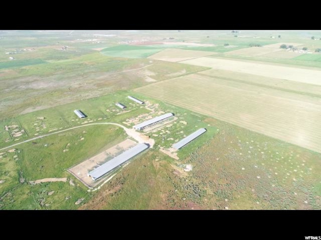 1300 5000 E N Chester, Utah 2 AC FT WATER RIGHT INCLUDED. Come enjoy the beautiful views of Skyline Drive (Manti La Sal Mountains). Being only 3 miles from Spring City, you can be on the mountain within minutes from leaving your property. Sanpete County is ATV friendly. It has 2 older turkey barns (50x280, 34x252). The barns can be used for countless things, bring your horses or ATVs. Many older turkey sheds have been bought and used for horses and sheep. Natural gas runs on the east frontage of the property. There is power to the big east barn. Additional water is available for purchase. Square footage figures are provided as a courtesy estimate only and were obtained from Sanpete County. Buyer is advised to obtain an independent measurement.