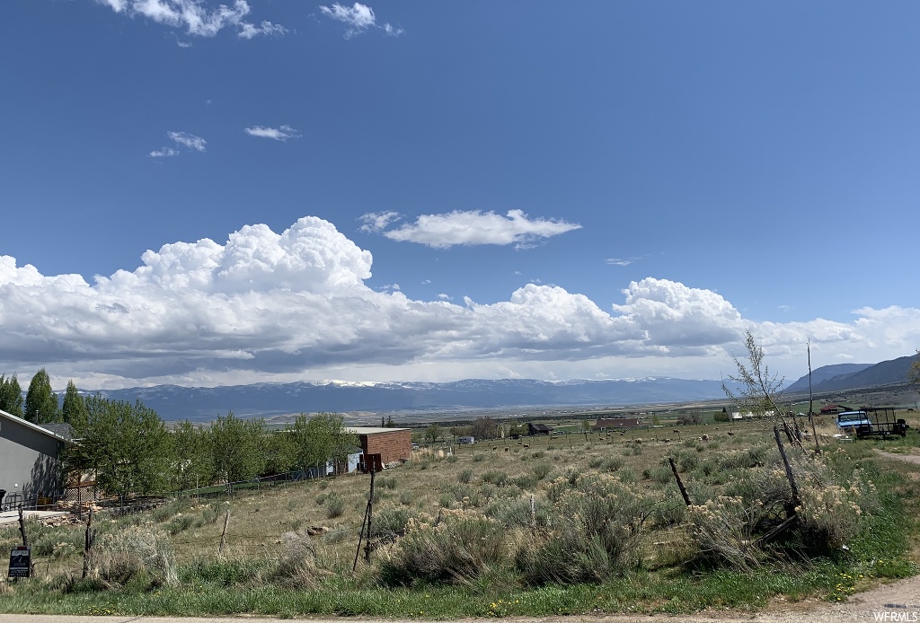 779 100 S W Fountain Green, Utah Build your dream house in the beautiful wide open spaces of the Fountain Green valley. This 1/2 acre lot is priced to sell and is perfect for anyone looking to build a new home and have extra space for yard, extra garage, RV parking, toy parking, etc. Per Fountain Green city, the lot is zoned residential agricultural and is a horse property. Utilities are available to the property at the street but do need to be connected. Motivated Seller! Buyer to verify all.