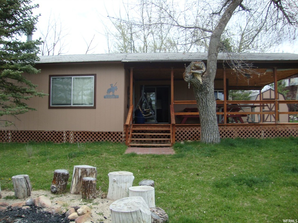 11980 SPORTS HAVEN DR E Fairview, Utah Home is in the full time area of Skyline Mountain Resort, single level living with 2 bedroom, 1 bath, kitchen, and large living/family room. One of the bedrooms has 4 full size beds, and could be divided making it two bedrooms. Large covered deck for entertaining and enjoying family time outside. .8 acre lot with mature trees, grass, fire pit, and plenty of parking. Refrigerator, washer , and furnishings included. Ready to move in and enjoy.
