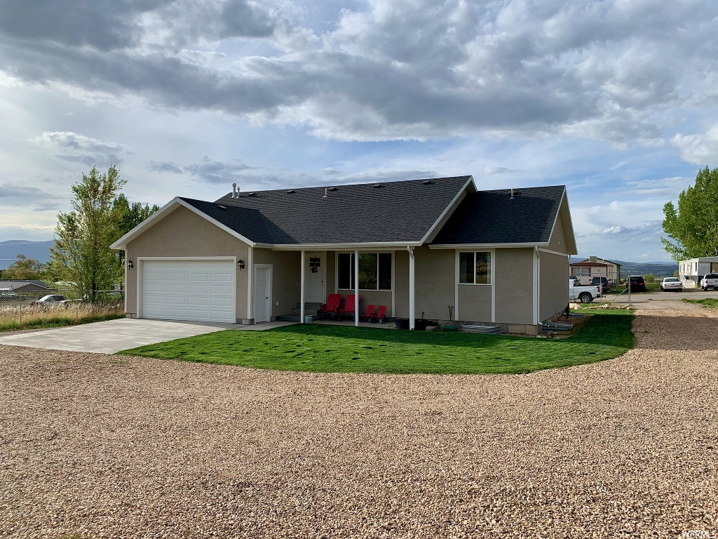 660 400 N E Spring City, Utah Located on the East side of Spring City, the mountain views from this home are breathtaking!! A vaulted and open family/kitchen leave plenty of room for friends and family to gather. The home is perfectly situated on the large lot to take advantage of the views and front porch privacy (1.06 Acre). The closets in this home are huge and plentiful. Main floor laundry. With over an acre, there is plenty of room for animals. Property perimeter is fenced. Fully Auto sprinkler system in yard. Storage shed included. Basement is fully framed, with one bedroom already completely finished.