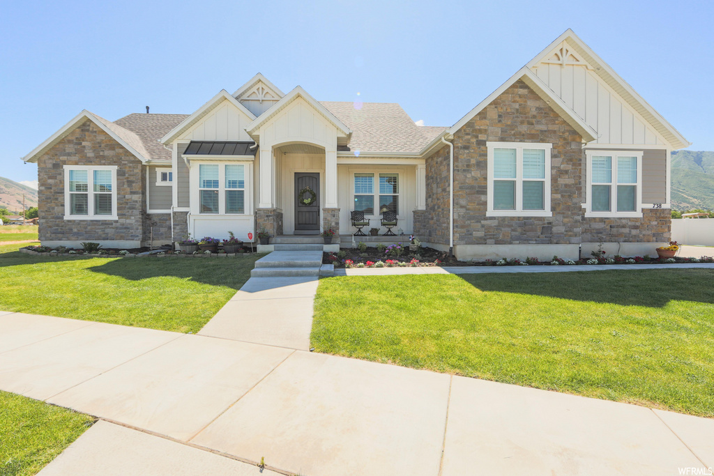 738 N 550 W Mapleton, Utah Click "view tour" for a video walk through! **Open House Friday July 17th from 4-6 pm** Just a short commute from I-15 takes you to the incredible foothills of Mapleton! Fall in love with this stunning rambler located on 0.51 acre lot w/ mountain views! Built just over a year ago, this 4 bed 3.5 bath home is just over 5400 sq ft. And packed full of modern comforts and features like... Open floor plan w/ main floor living. 2x6 Construction. Quartz & granite countertops. Custom cabinets. Craftsman beams & millwork. 3 car garage. Raised ceilings in the great room and 9' ceilings throughout. Heavy sound board insulation surrounding the front living room. Large walk in pantry with hidden cabinet entry. French Doors. Spacious master ensuite with patio access. A built in office/craft-room off the kitchen. Fully landscaped yard with lots of hardscape for entertaining. Although the Swim spa is excluded, the concrete underneath is steel reinforced for the next owner to do the same. There is a grand 1 bed 1 bath mother-in-law apartment with its own private access and HVAC, and more space to finish as you desire!