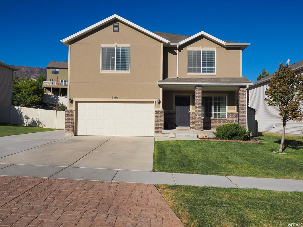 3495 S HAWK DR W Saratoga Springs, Utah *NO SHOWINGS UNTIL 10/3* Rare find, Single Family home for under $400K!! This 3 bedroom plus large loft offers great space. Couple that with a fantastic community with the best views in Utah. Walk out your front door to find incredible views Utah Lake and Timpanogos mountain range. With an open floor plan on main, large bedrooms, including an oversized master bedroom with a huge separate bath and large walk-in closet. Throughout the home you will find updated flooring, blinds, and fresh paint. There is the laundry area on the upper level as well as a bonus room to use as an extra TV room, kids play area or just a sitting room to enjoy that book while staring out the window at the gorgeous views of the Lake and Mountains. The private fully fenced back yard offers a safe place for pets and kids to roam. Close to the Maria, Golf course, and mountains for any recreational activities. This home is priced to sell and move-in ready.