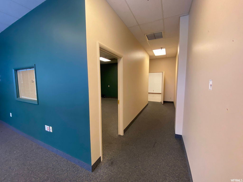 corridor featuring carpet