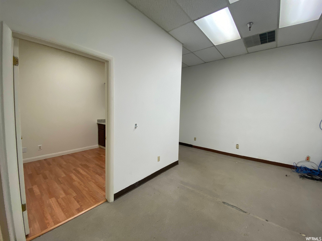 spare room featuring hardwood floors