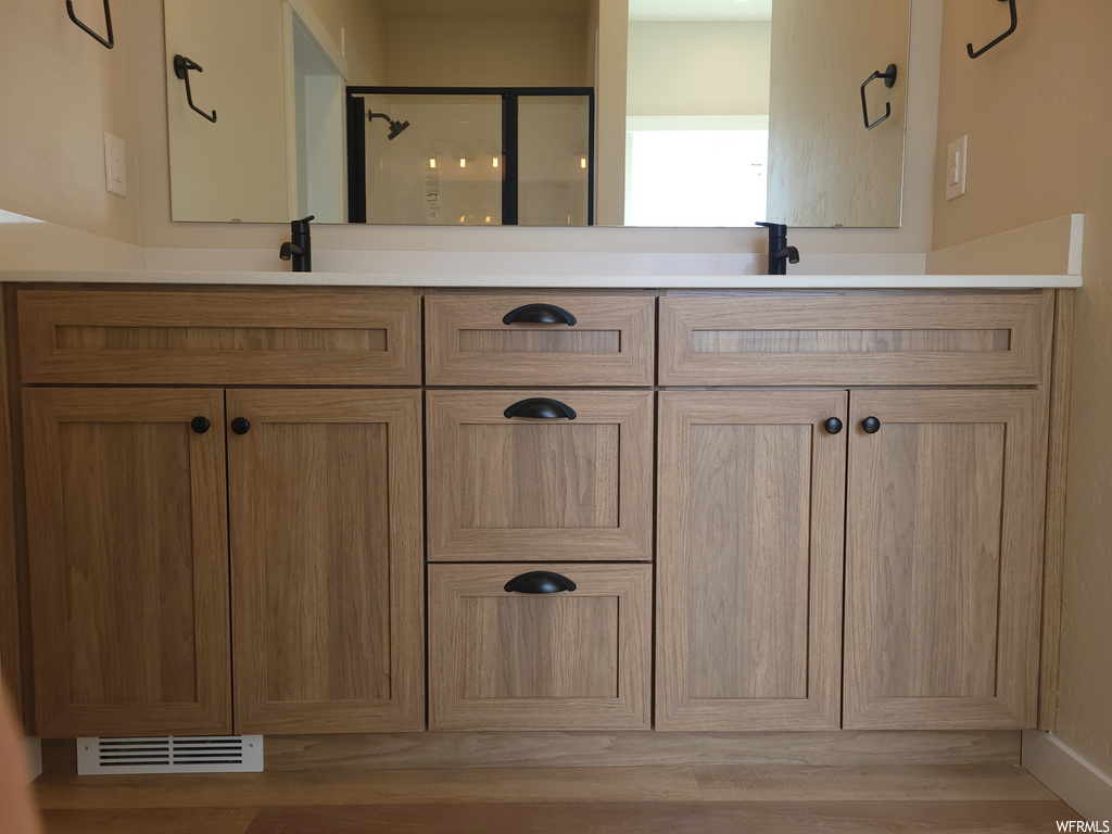 Bathroom with dual mirrors and double large vanities
