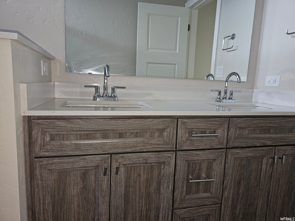 Bathroom with mirror and double large sink vanity