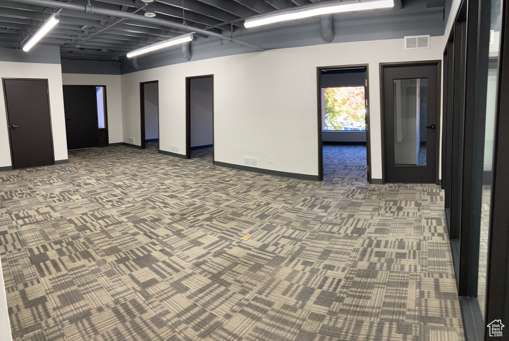 Unfurnished room featuring carpet floors