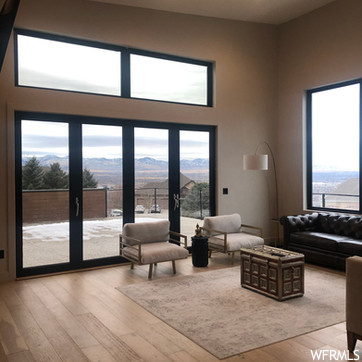 living room featuring natural light and french doors