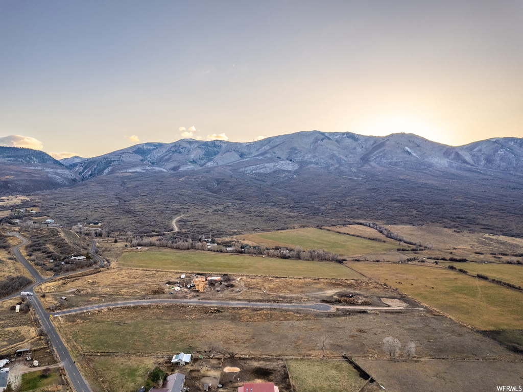 Property view of mountains with a rural view