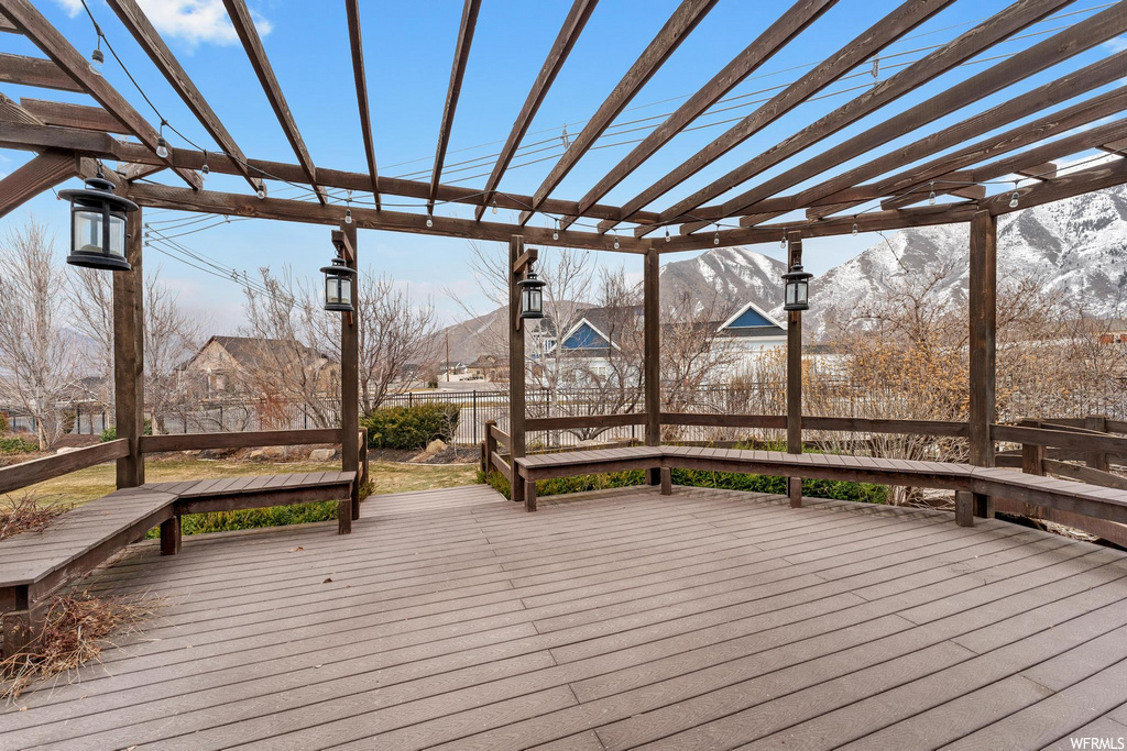 wooden deck with a pergola