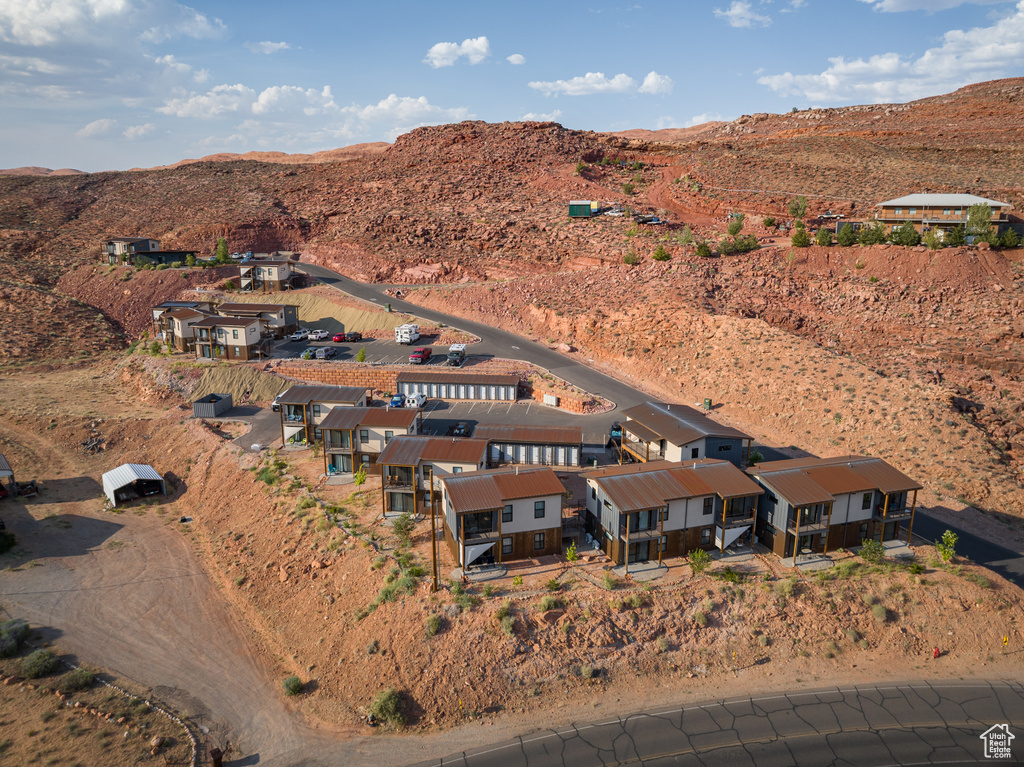 Aerial view of property\'s location featuring mountains and nearby suburban area