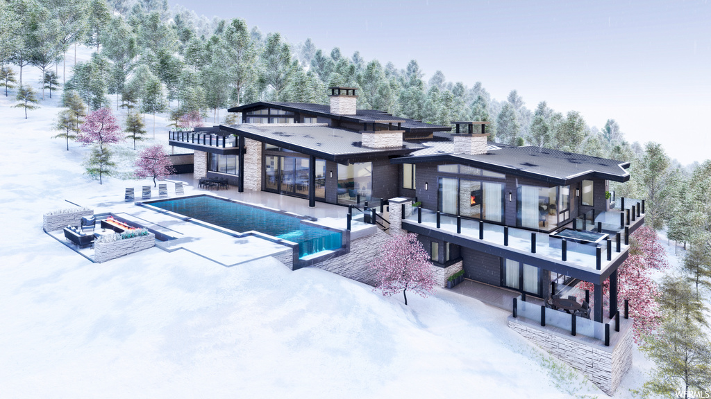 back of house featuring a pool