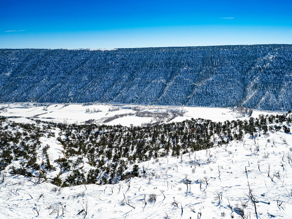 view of mountain feature with a water view