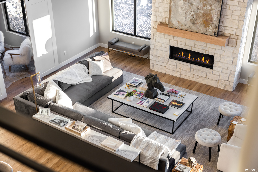 Hardwood floored living room with a fireplace