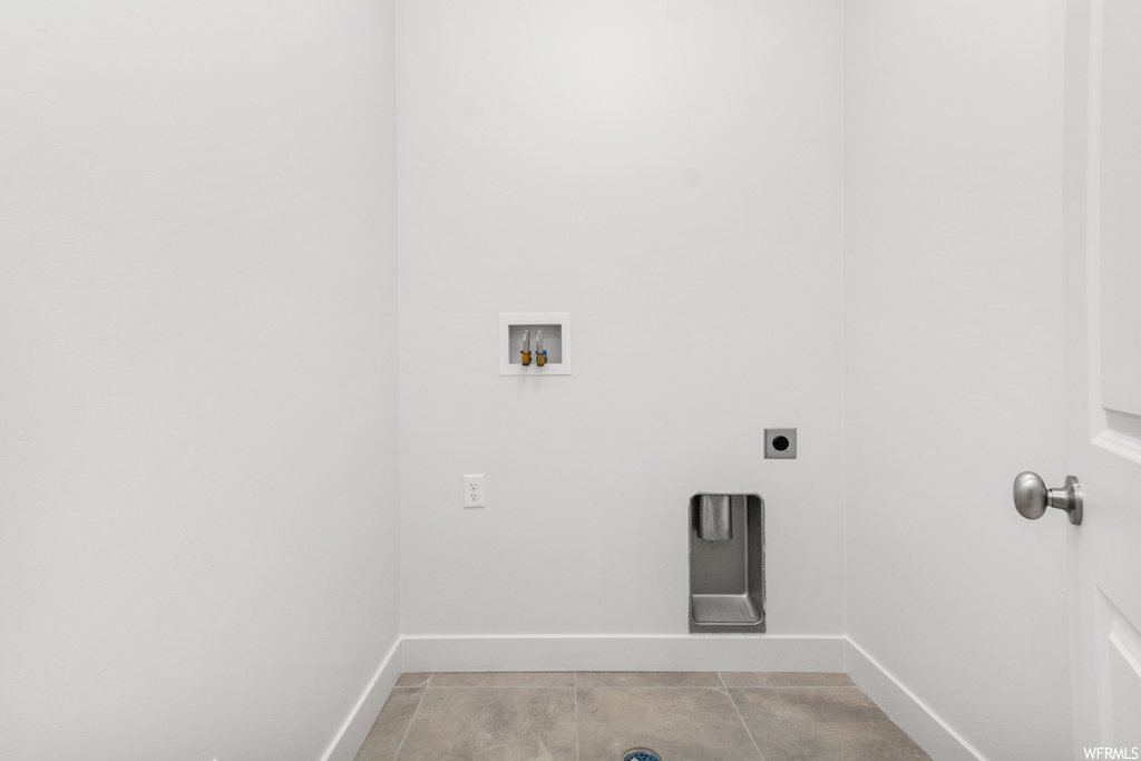 washroom featuring tile floors