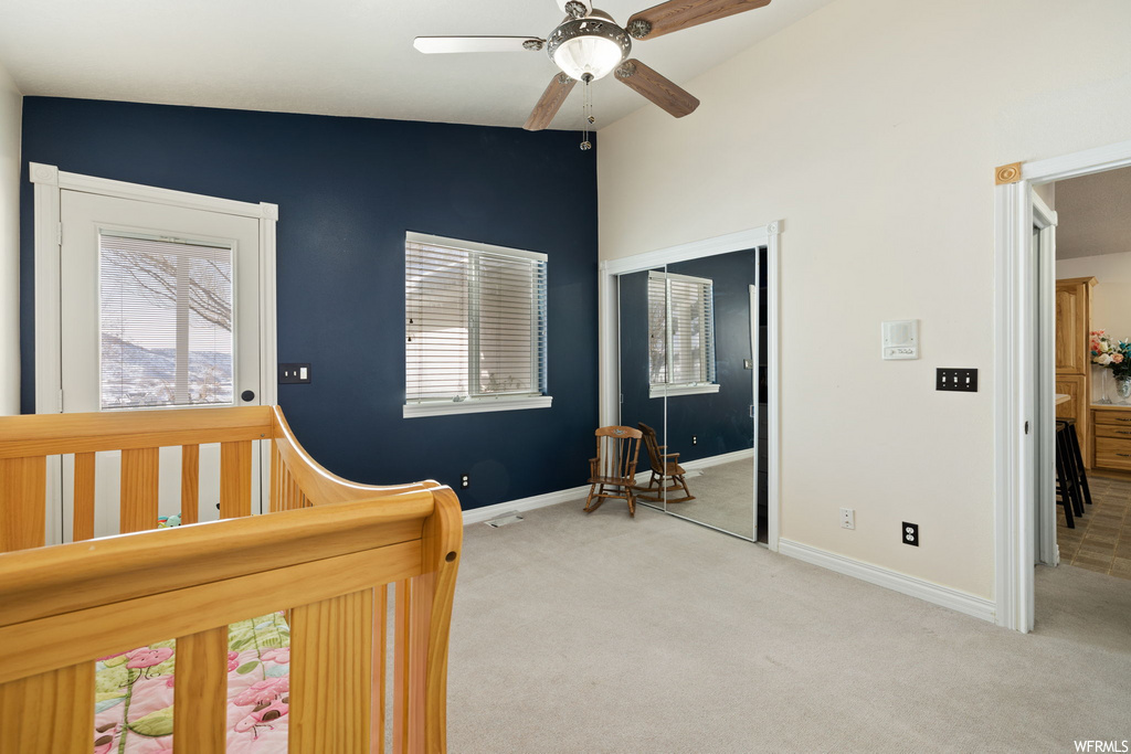 bedroom with carpet and a ceiling fan