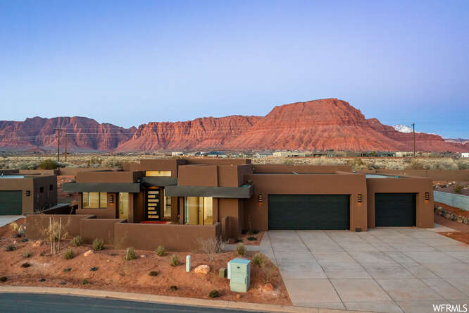 view of front of property with a mountain view