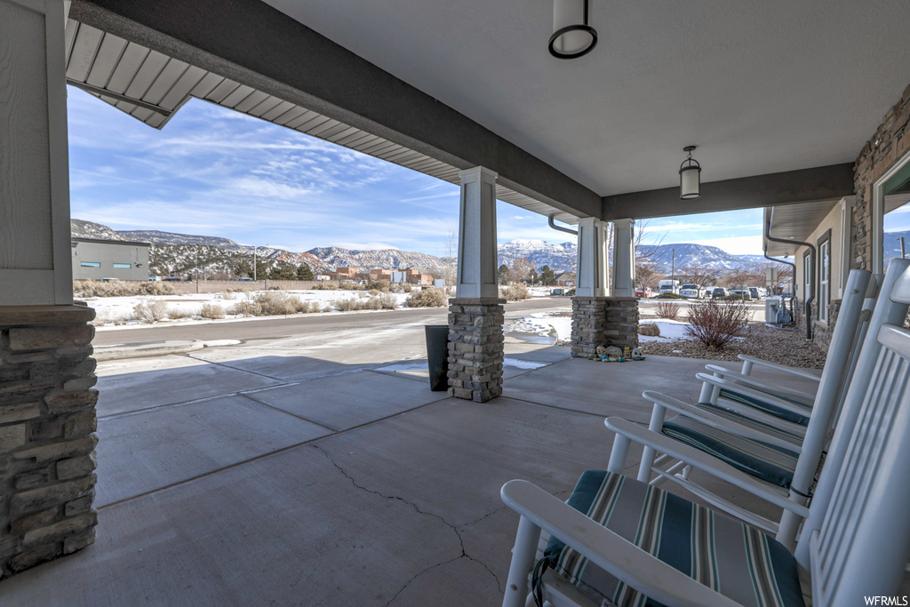 view of patio / terrace with a mountain view