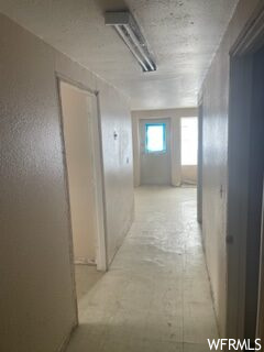 corridor featuring natural light